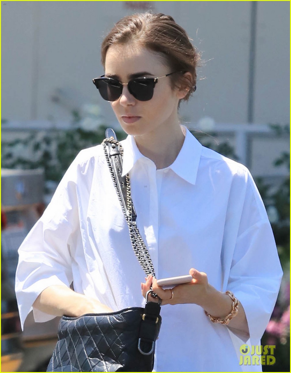 lily collins adds a pretty touch to her casual ensemble2 03