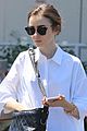 lily collins adds a pretty touch to her casual ensemble2 03