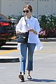 lily collins adds a pretty touch to her casual ensemble2 09