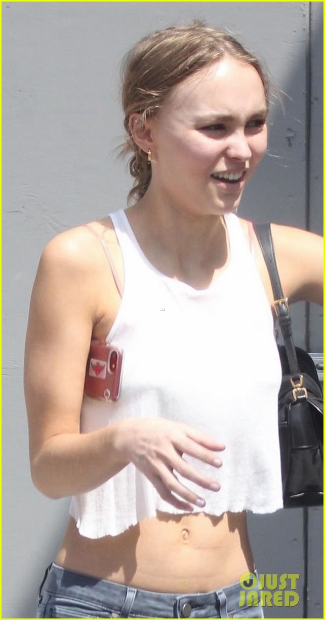 lily rose depp shows off her toned tummy in crop tank top 03