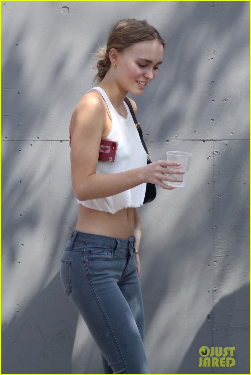lily rose depp shows off her toned tummy in crop tank top 05