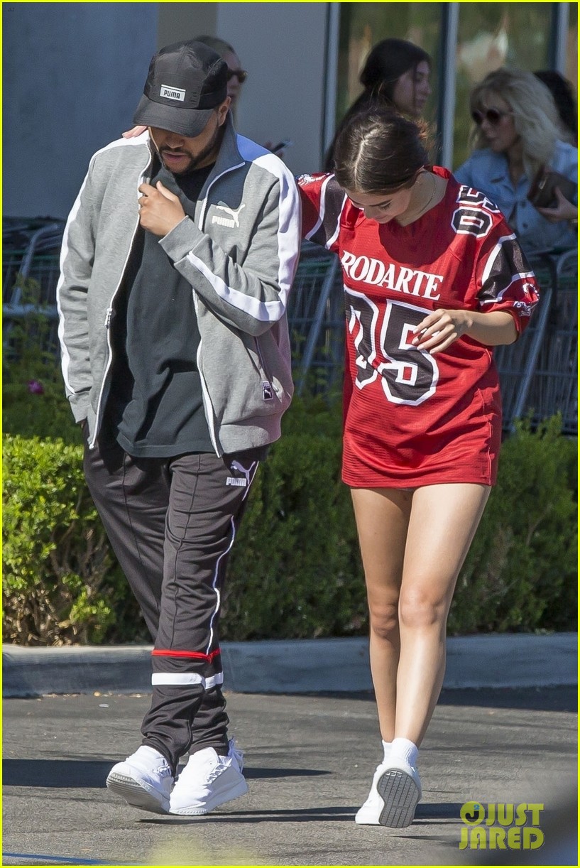 selena gomez nuzzles up to the weeknd 01