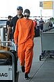 kendall jenner wears all orange for her flight out of new york 01