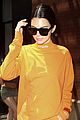 kendall jenner wears all orange for her flight out of new york 02