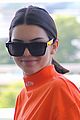 kendall jenner wears all orange for her flight out of new york 04