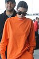 kendall jenner wears all orange for her flight out of new york 06
