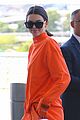 kendall jenner wears all orange for her flight out of new york 09