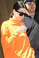 kendall jenner wears all orange for her flight out of new york 10