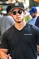 nick jonas supports the yankess while out in nyc 02