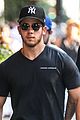 nick jonas supports the yankess while out in nyc 04