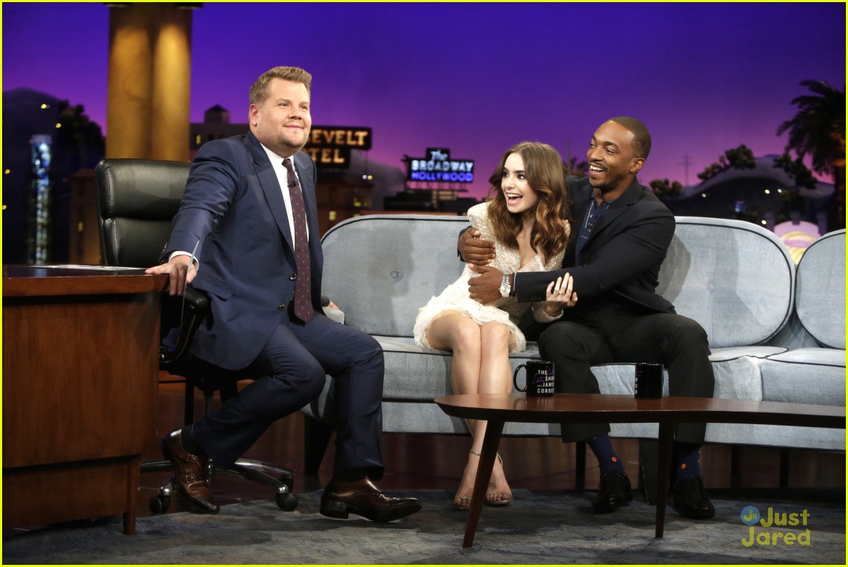 lily collins eyebrow touching james corden 04