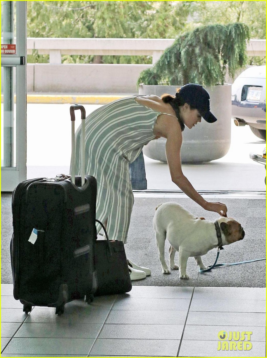lucy hale jets out of vancouver 03