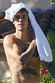 justin bieber goes shirtless and flashes his abs during walk around la 05
