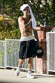 justin bieber goes shirtless and flashes his abs during walk around la 06