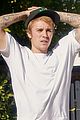 justin bieber goes shirtless and flashes his abs during walk around la 07