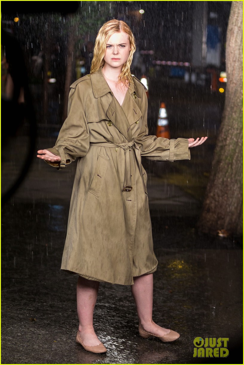 elle fanning braves the rain while filming woody allen movie 01