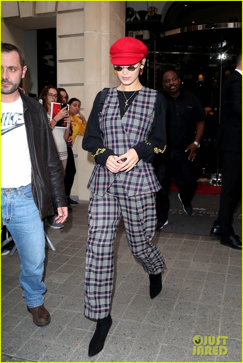 bella hadid shows off her love for patterns while leaving paris 01