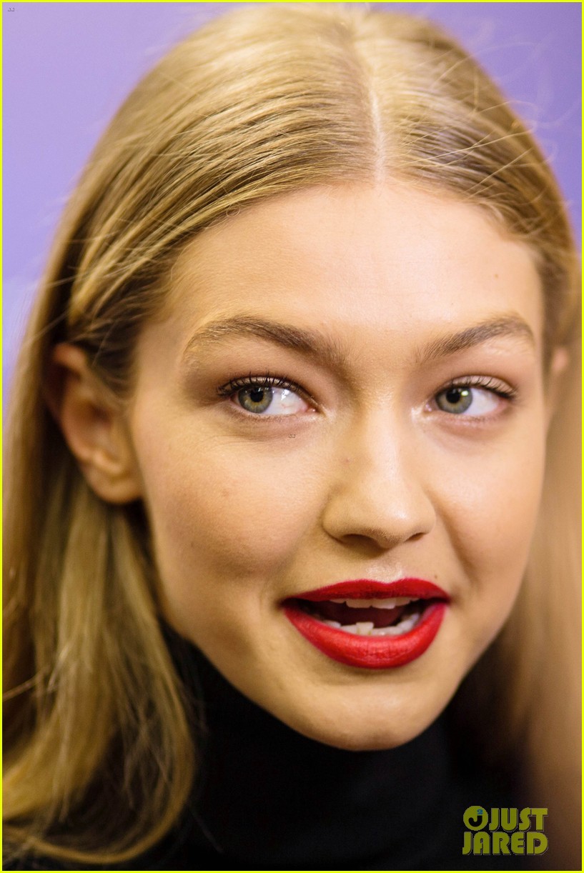 gigi hadid flaunts toned abs at tommy hilfiger event in spain 03
