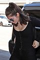 lorde keeps her head low for her flight out of town 04