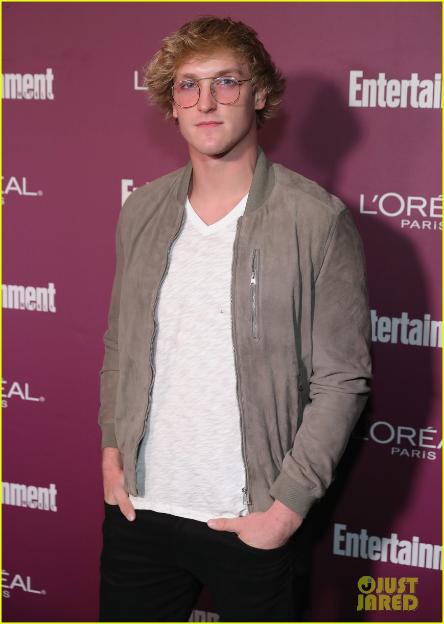 logan paul and chloe bennet strike a pose at pre emmys party 01