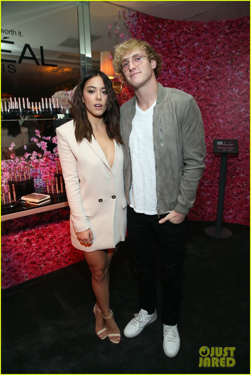 logan paul and chloe bennet strike a pose at pre emmys party 04
