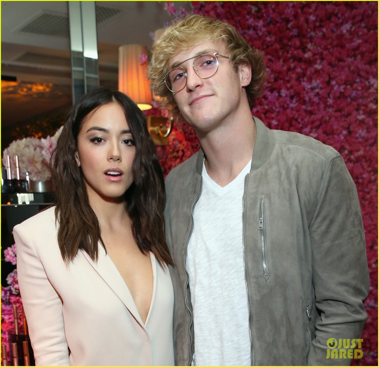 logan paul and chloe bennet strike a pose at pre emmys party 06