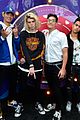prettymuch poses with pizza cuddles with puppies at iheartradio music festival 05