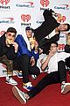 prettymuch poses with pizza cuddles with puppies at iheartradio music festival 07