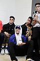 prettymuch poses with pizza cuddles with puppies at iheartradio music festival 09