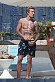 shirtless justin bieber puts toned abs on display in mexico 09