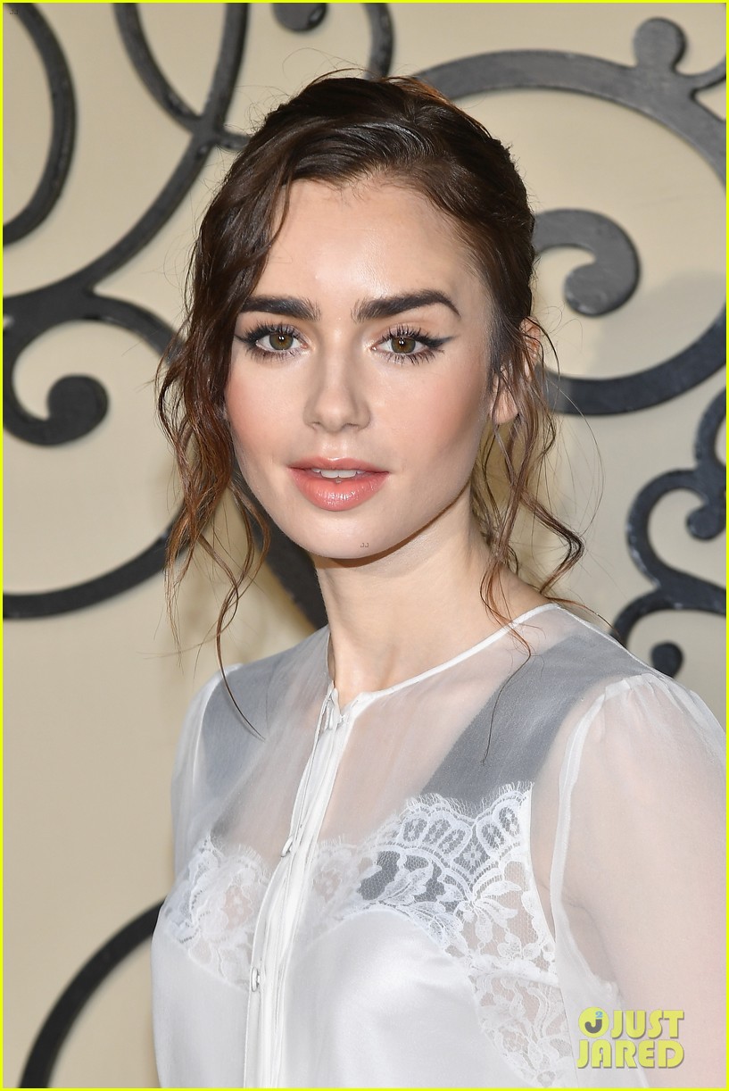 lily collins sits front row at givenchy paris fashion show 04
