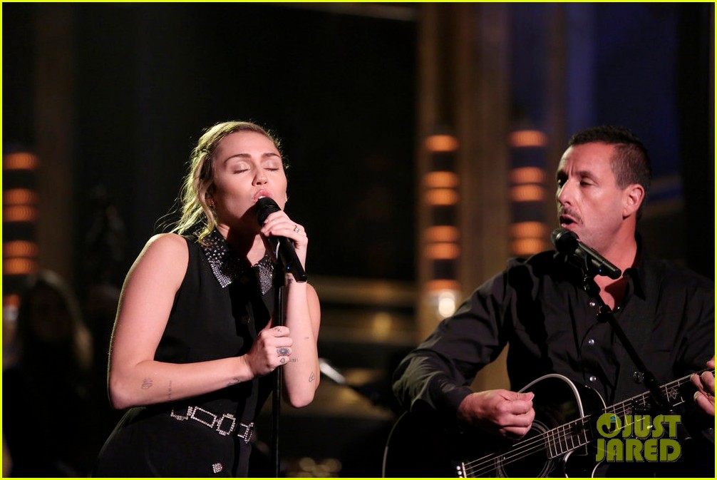 miley cyrus performs the climb on fallon as message of unity 07
