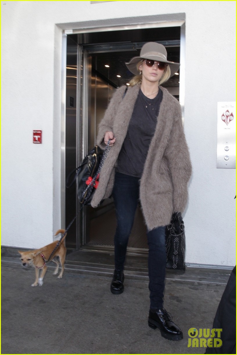 jennifer lawrence arrives at lax with her cute dog in tow 01