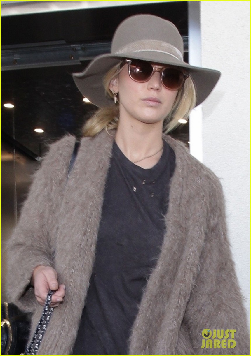 jennifer lawrence arrives at lax with her cute dog in tow 03