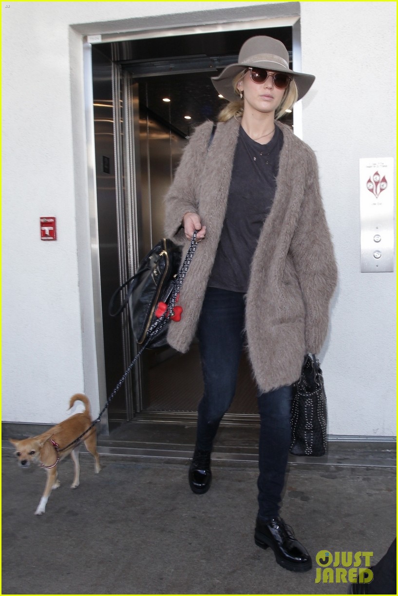 jennifer lawrence arrives at lax with her cute dog in tow 04