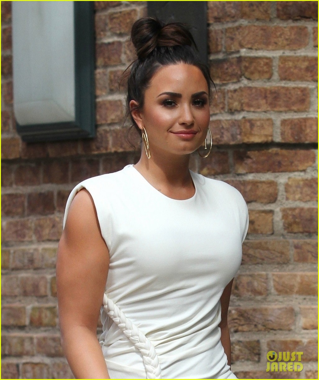 demi lovato wears a dress with a braid down the side 04