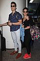 brandon larracuente shows off bulging biceps at airport with girlfriend 02