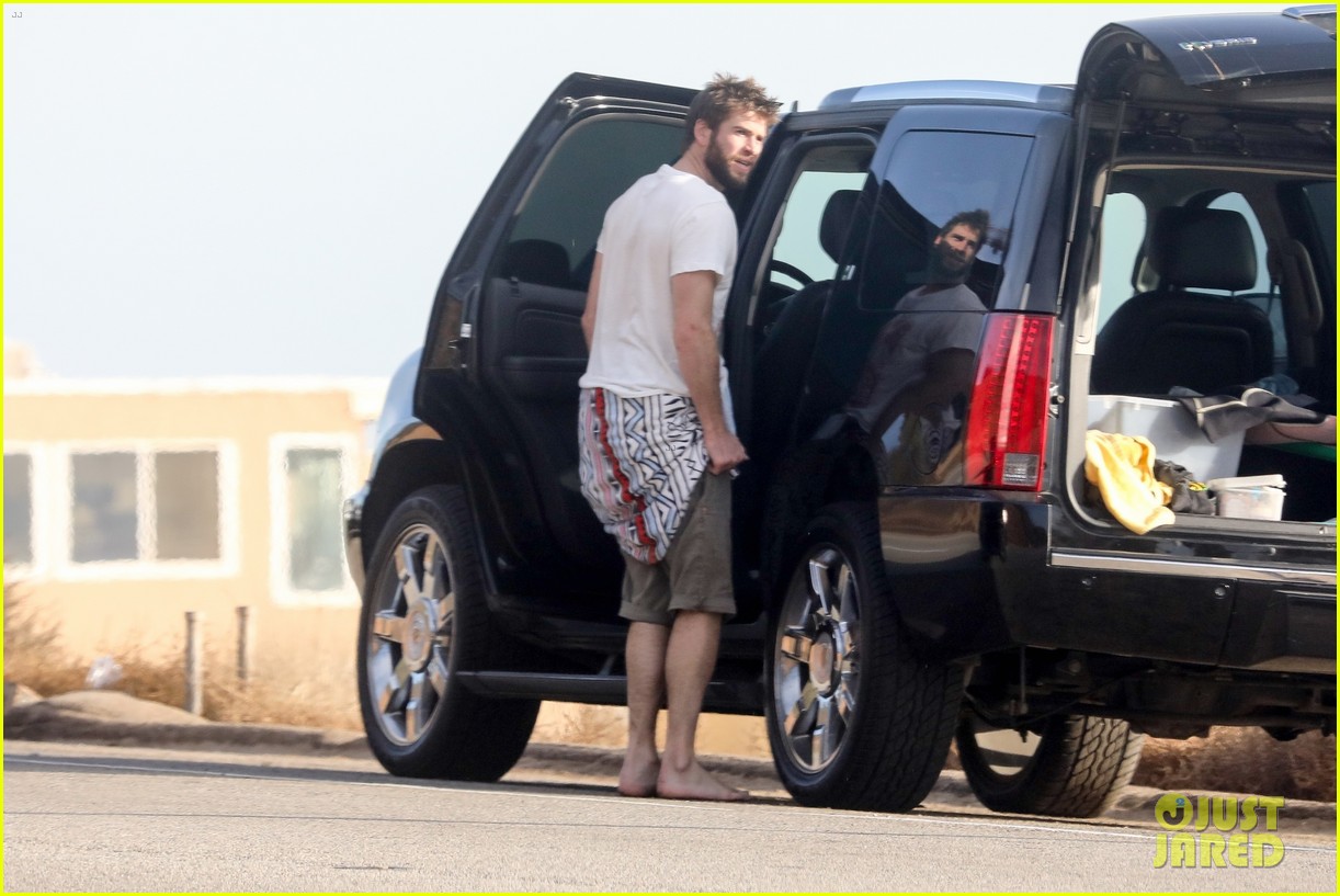 liam hemsworth spends the afternoon surfing in malibu 16