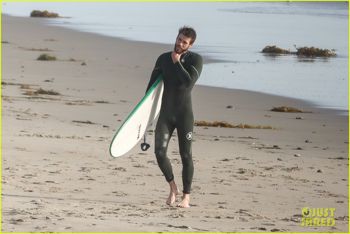liam hemsworth spends the afternoon surfing in malibu 17