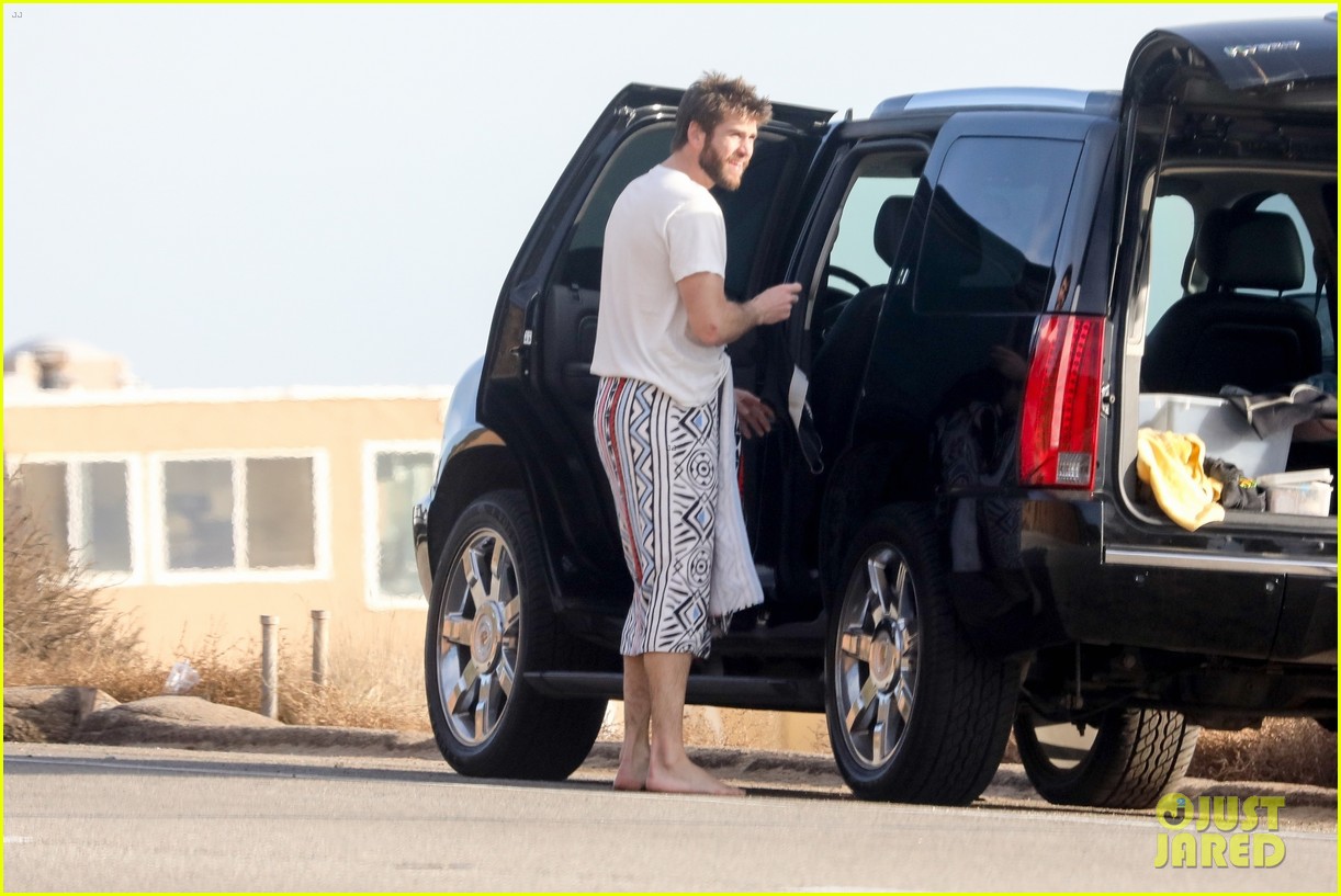liam hemsworth spends the afternoon surfing in malibu 20