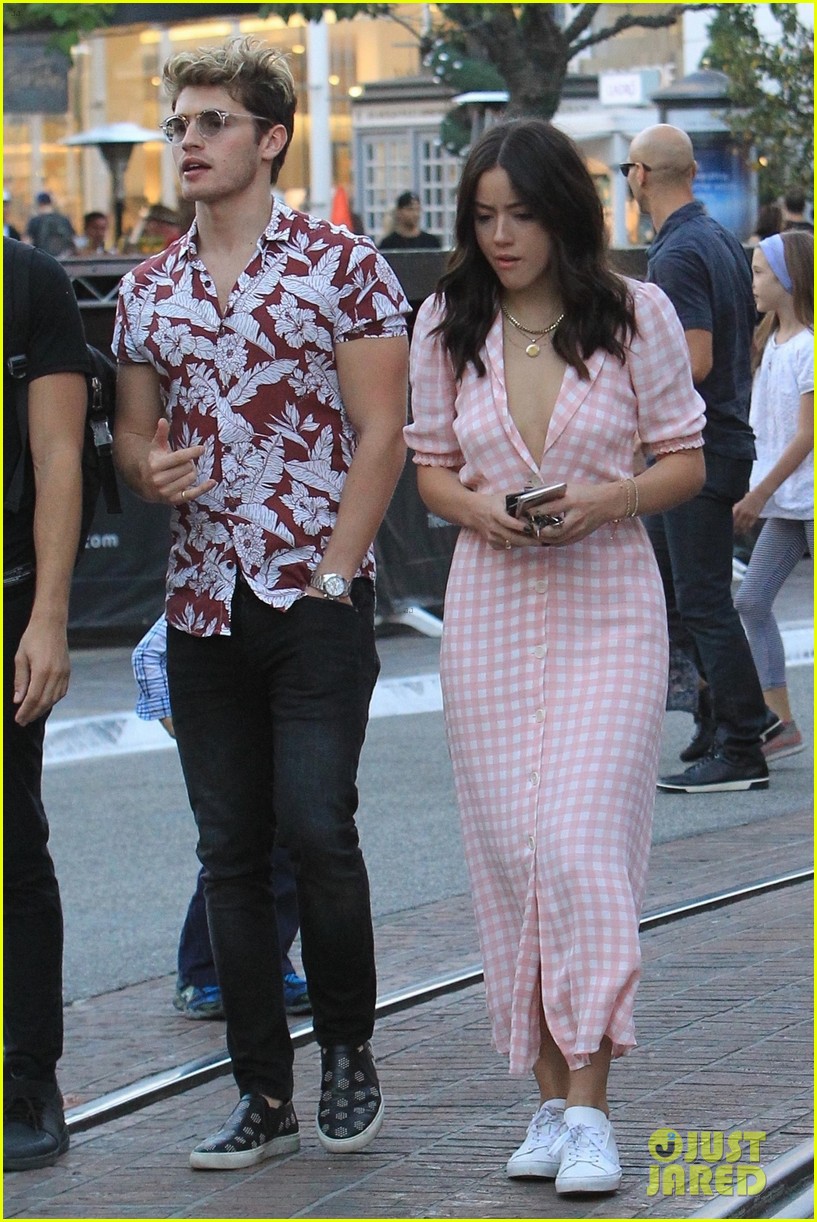 gregg sulkin and chloe bennet step out together at the grove 02