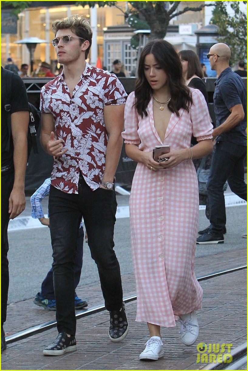 gregg sulkin and chloe bennet step out together at the grove 04