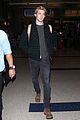 joe alwyn lands in los angeles in time for new years day 26