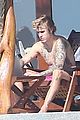 justin bieber arrives in mexico for nye with selena gomez 30