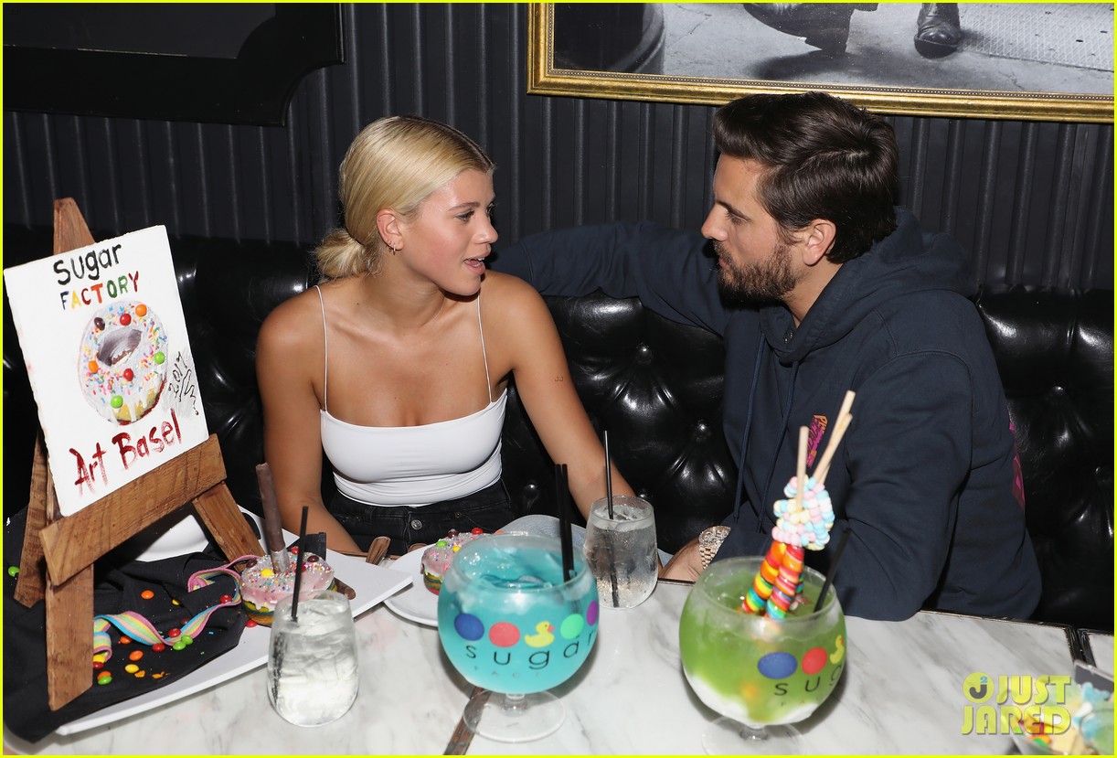 scott disick sofia richie kiss for the cameras at art basel 09