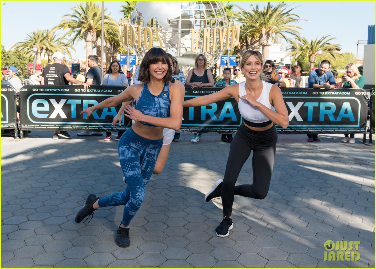 nina dobrev shows off her fit physique on extra see pics 01