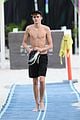 presley gerber flaunts his abs while going shirtless at the beach 10