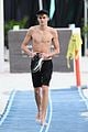 presley gerber flaunts his abs while going shirtless at the beach 13