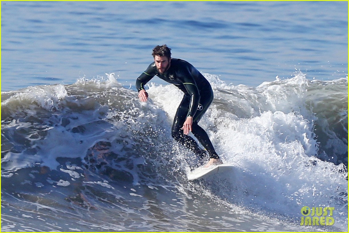 liam hemsworth gets shirtless after surfing in malibu see pics 02