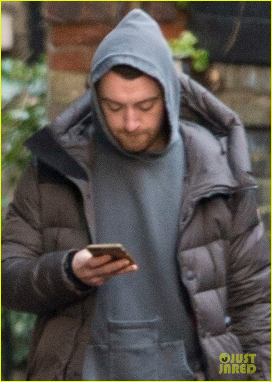 sam smith bundles up for a stroll in london 02